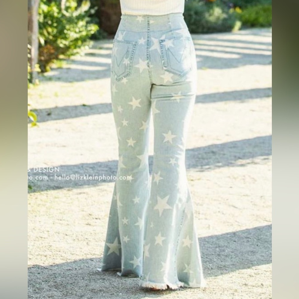 Flared jeans with white star